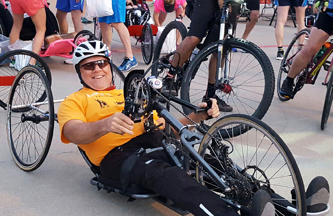 powered to move, athletes with disabilities, inclusive physical fitness, assisted athletes, adaptive sports, handcycling, donations, donate, volunteering, charity, nonprofit organization